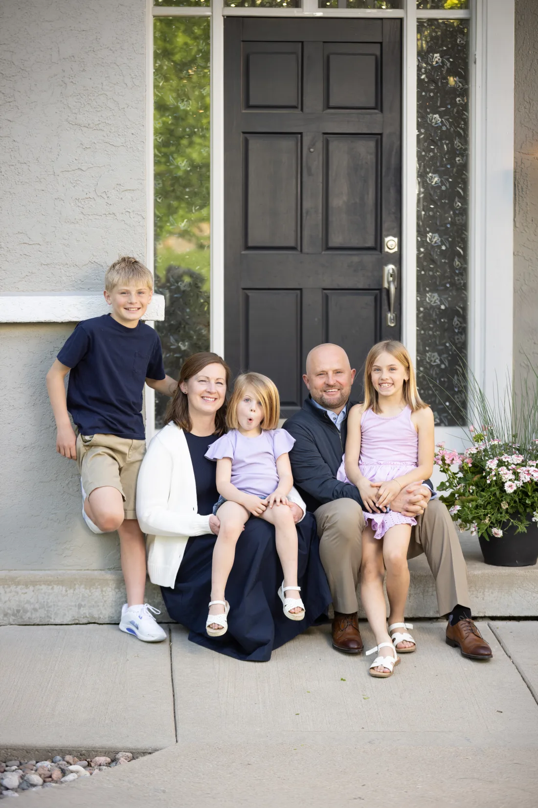 The Rogers family on their front porch.